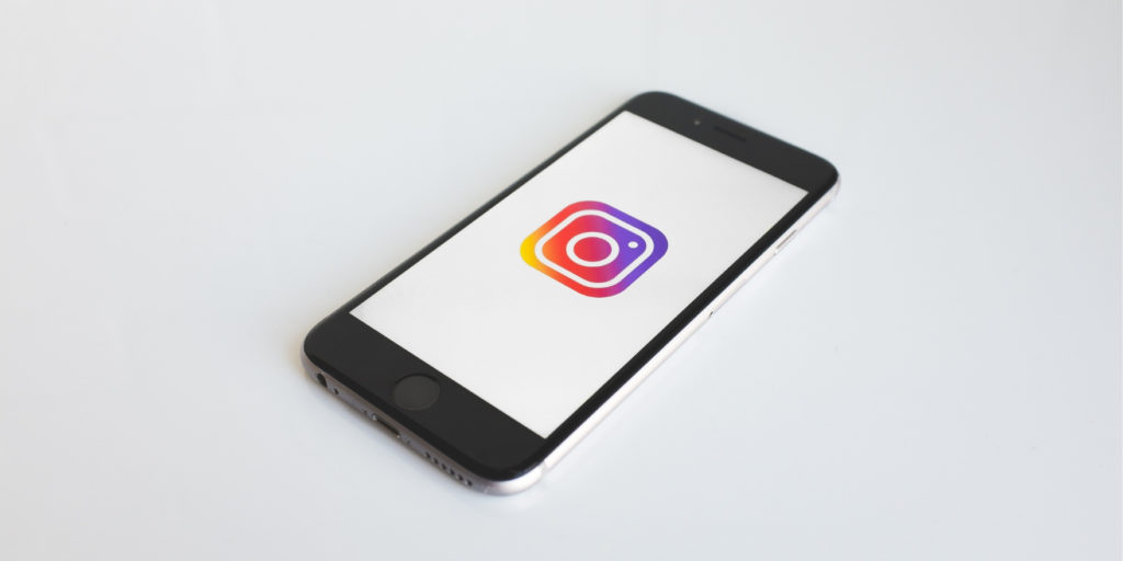iPhone with an instagram logo